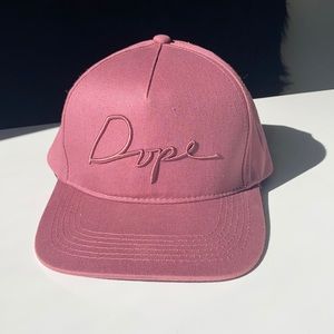 DOPE snap back hat. Dark rose color.